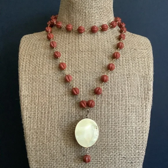 Vintage gold over sterling genuine carved jasper pendant necklace.